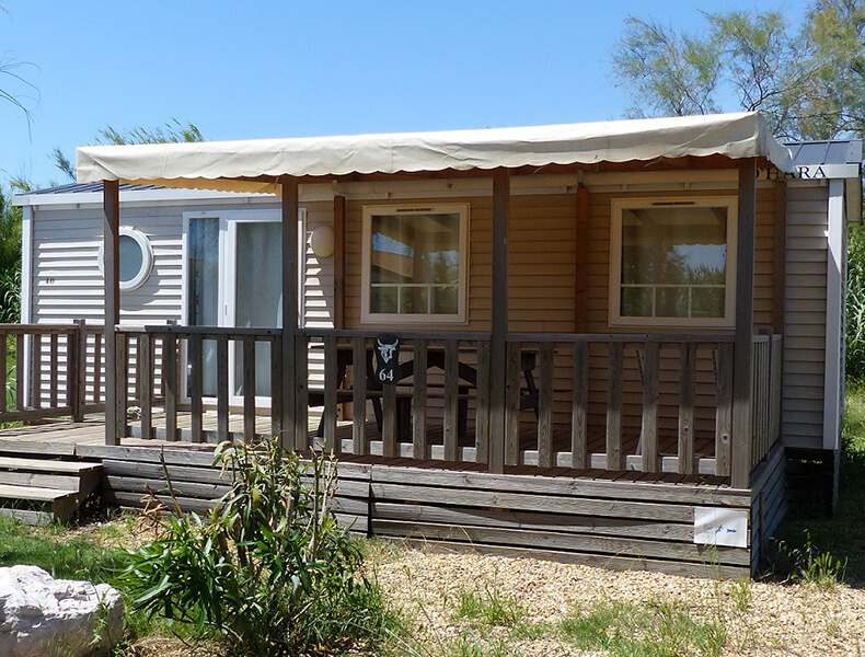 Verhuur van stacaravans in de buurt van Palavas, camping le Camarguais bij Montpellier : Bandido model airconditioning 4/6 personen